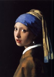 classic Vermeer portrait of a young woman wearing a blue headscarf