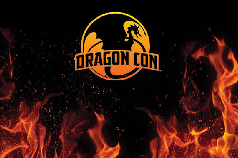 DragonCon logo with black background and red/orange flames